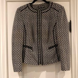 Black and white short jacket with zipper. By Gerry Weber. Size 12.